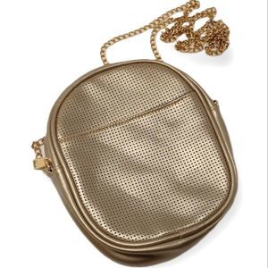 A gold purse with zipper